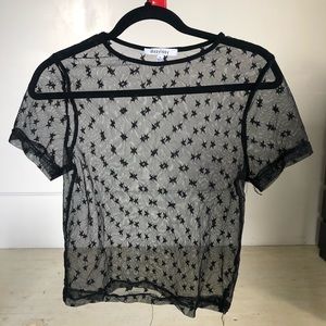 Shear star short sleeved top